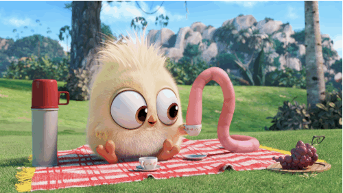 this is a gif image from the angry birds hatchlings movie of a baby bird and a worm on a picnic