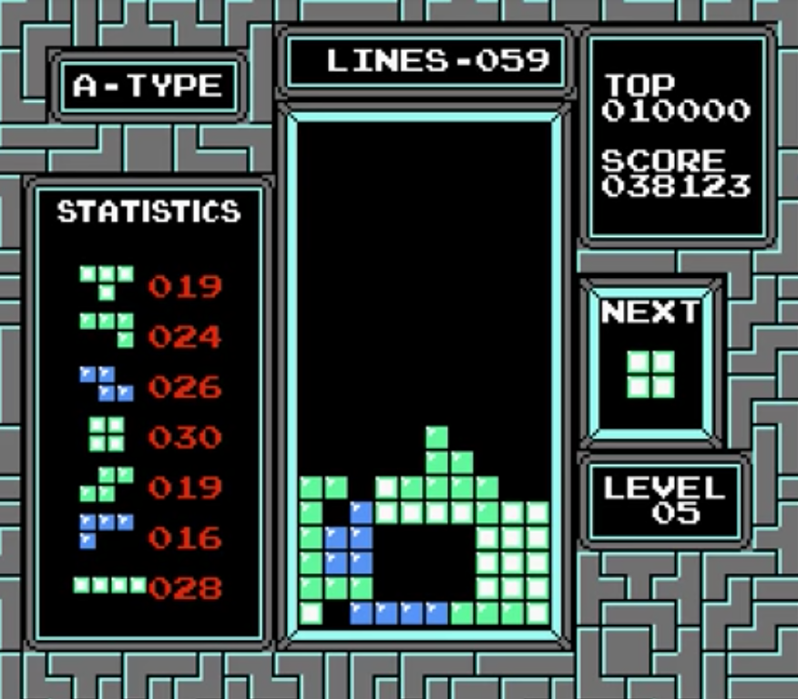 This is a screenshot of tetris nes showing a classic game of tetris that illustrates a psychological need to complete.
