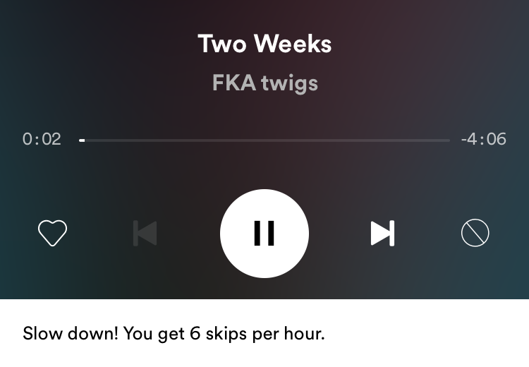this is a mobile sceenshot of the spotify app free version that shows a banner notification that says: slow down! you get 6 skips per hour.