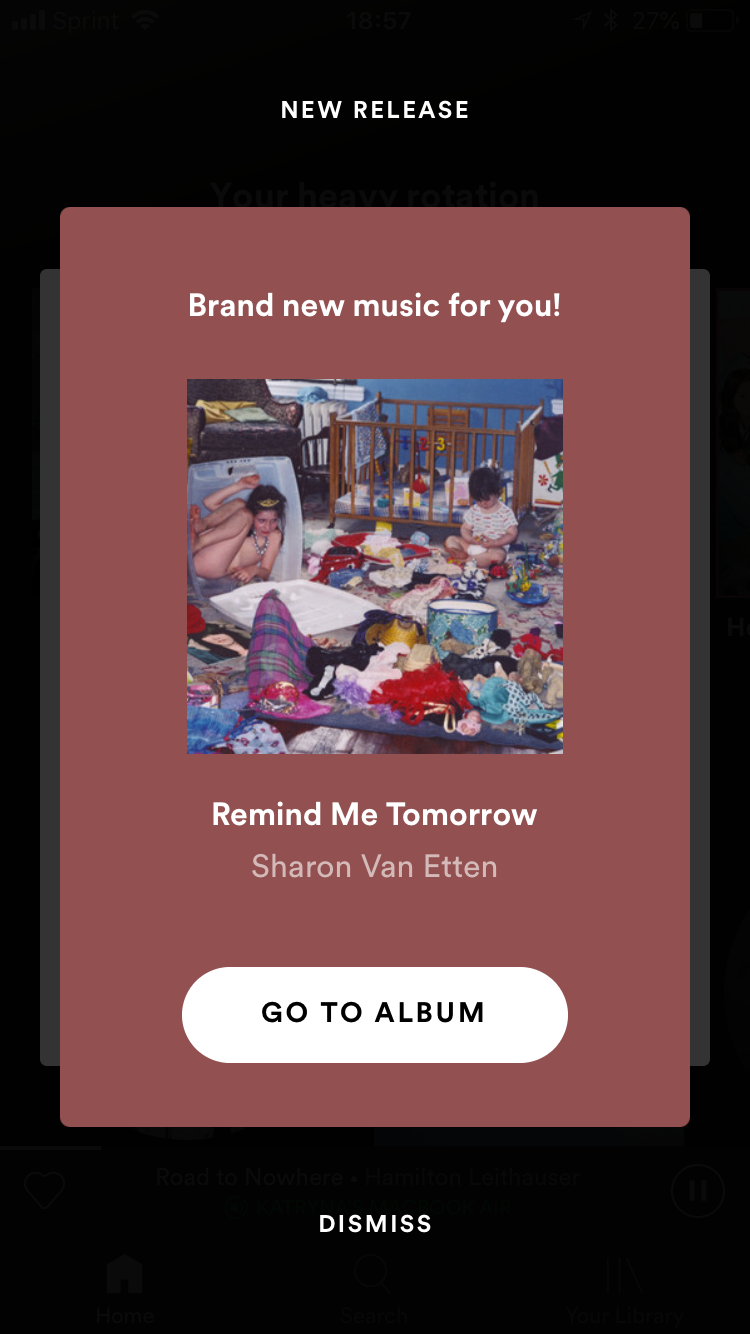 This is an example of a lifecycle nudge in app messaging modal from spotify's mobile app. It says "brand new music for you" with a cta "go to album"