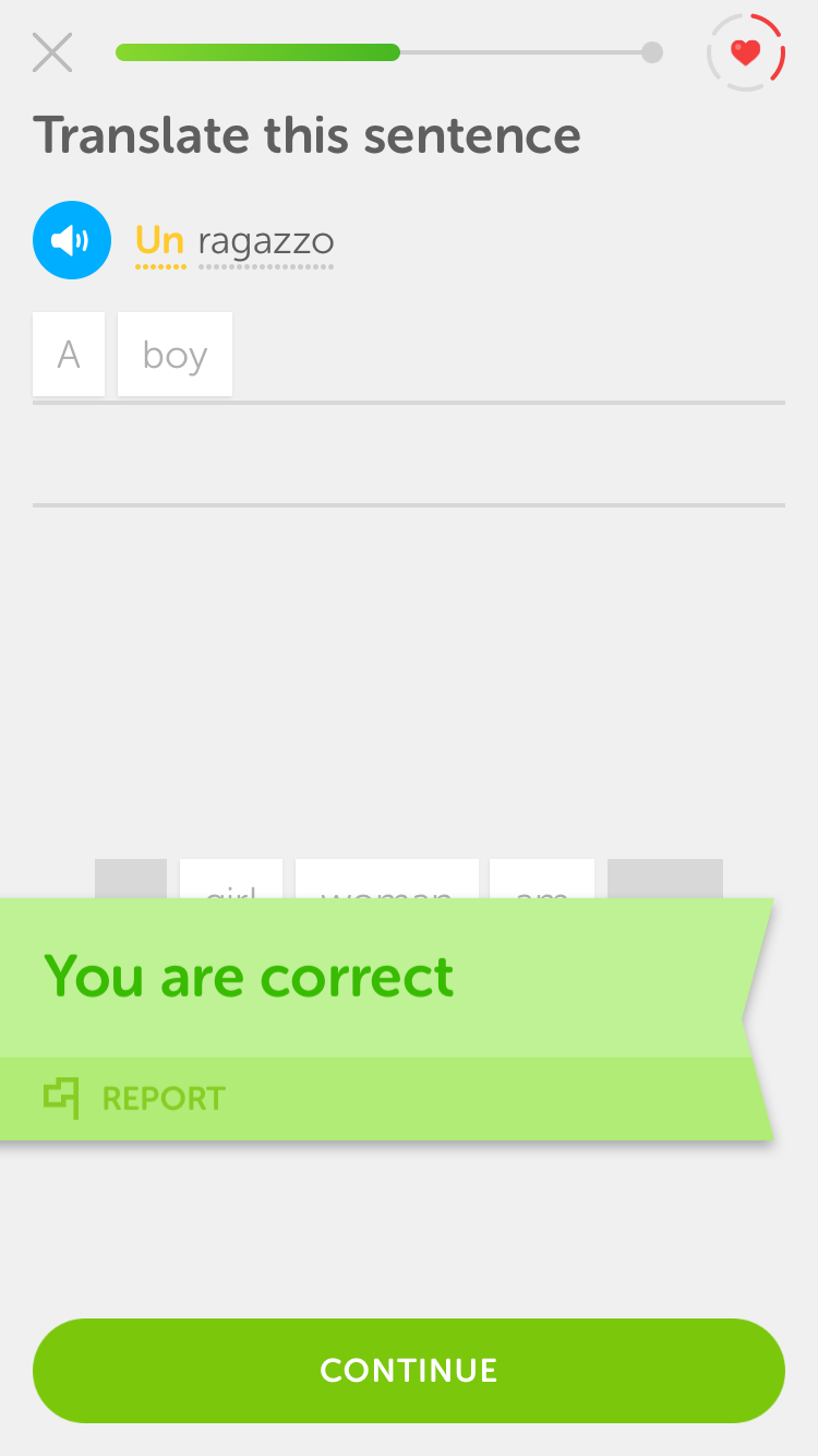 This is a screen capture of Duolingo's mobile app showing interactive onboarding. Users learn by doing and the product demonstrates its value through its UI. It is a screenshot of an Italian language lesson in which the user is asked to translate "un ragazzo", which means "the boy". There is a progress bar at the top and a badge that says "you are correct" at the bottom. 